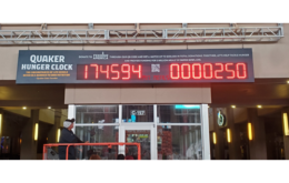 15 inch LED network IP controlled number display representing countdown to super bowl 57 in minutes and the number of packets of food donated