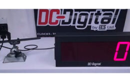 Hourly Rate COunter Clock for Production truck companies with an area sensor on White Table DC-Digital