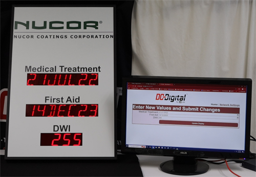 Safety scoreboard and computer showing the network webpage of the dates and days since last incident accident first aid medical treatment